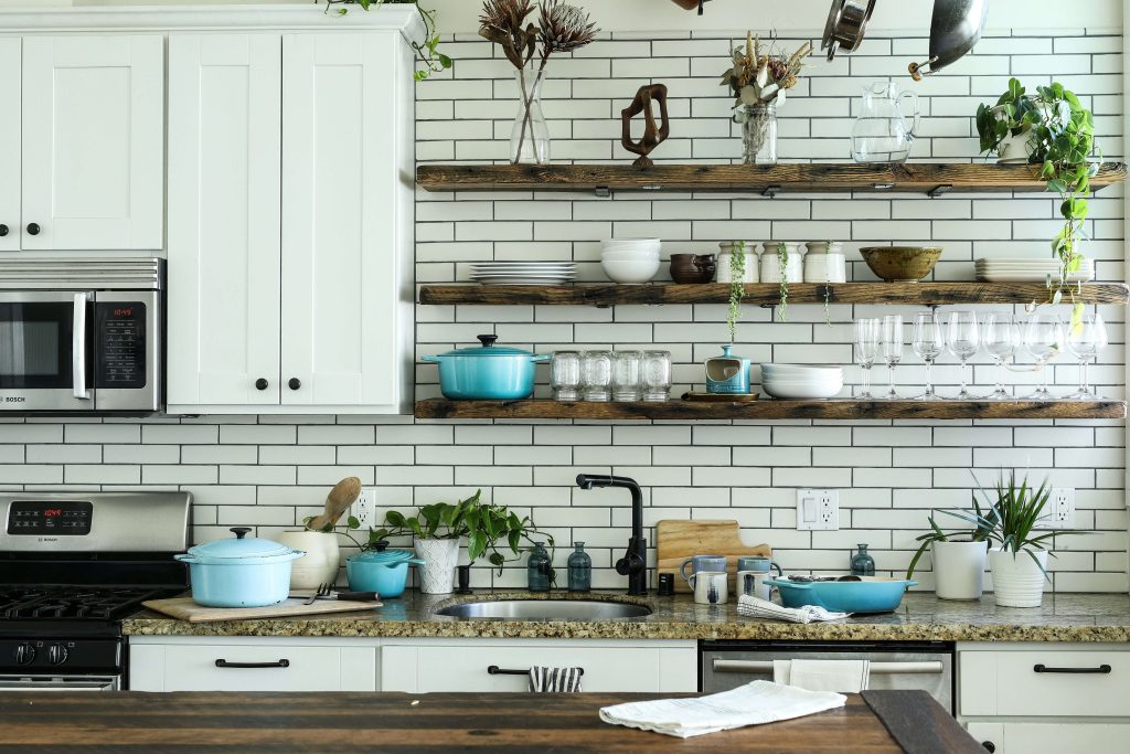 Neatly divided kitchen drawer with organized utensils
